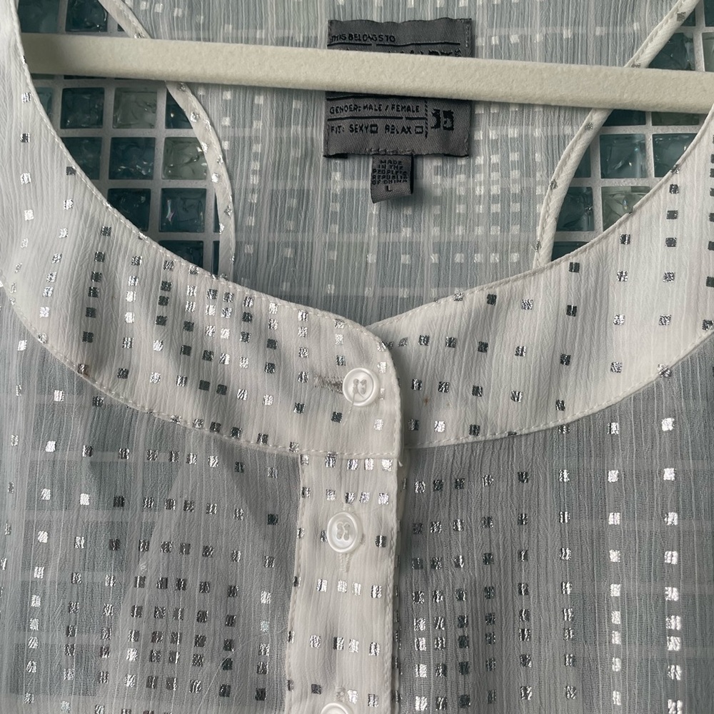 The Shirt by Rochelle! Sheer with silver design.  Makes great Swim suit cover up